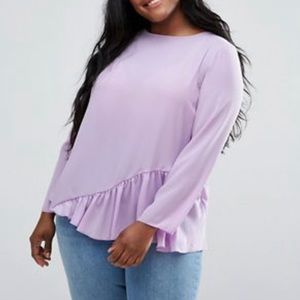 Long sleeve asymmetrical hem blouse